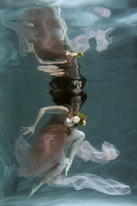 Woman swimming in sea