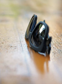 Close-up of eyeglasses on table