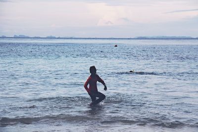 Man surfing in sea