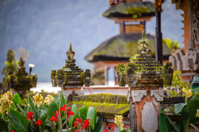 View of temple against building