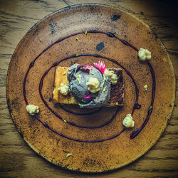 High angle view of ice cream in plate on table