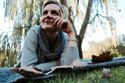 Woman lying in grass