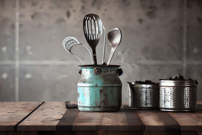 Close-up of kitchen utensils on table