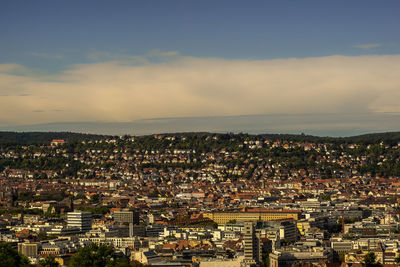 High angle view of illuminated city against sky