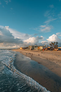 Scenic view of beach against sky during sunset