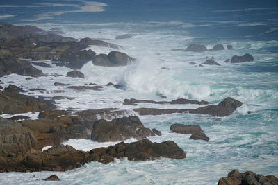 Scenic view of rocks in sea