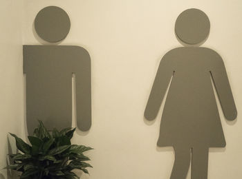 Shadow of man on white wall