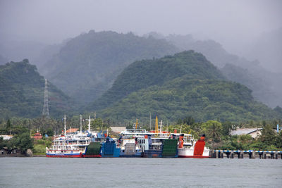 Scenic view of sea against mountains