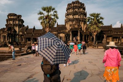 Group of people in front of historical building