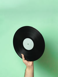 Hand holding vinyl record