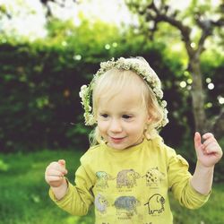 Boy with a clover wreath.