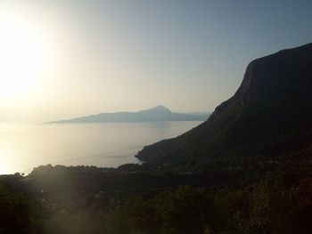 Scenic view of sea against clear sky during sunset