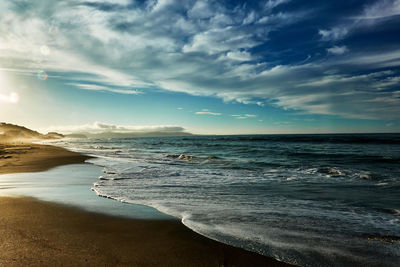 Scenic view of sea against sky during sunrise