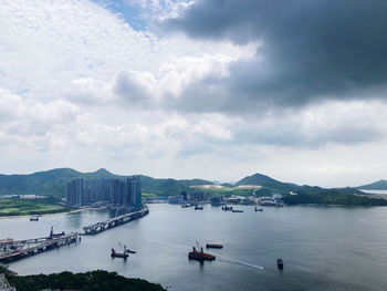 High angle view of boats in river against sky