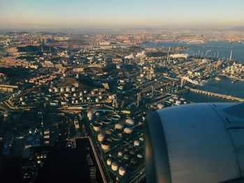 Aerial view of cityscape against sky