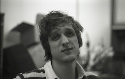 Close-up portrait of man with messy hair