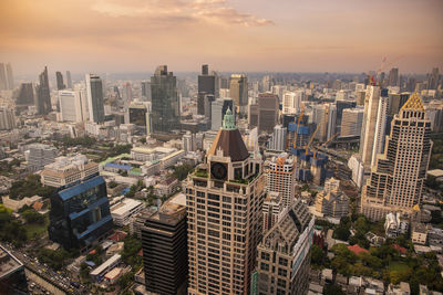 High angle view of cityscape against sky during sunset