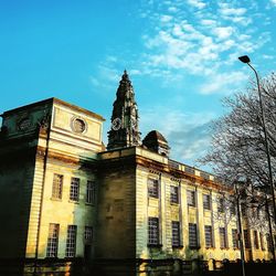 Low angle view of temple against blue sky