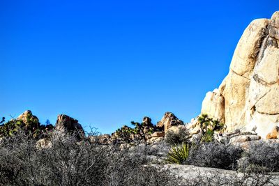 Rock formations against clear sky