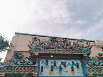 Low angle view of traditional building against sky