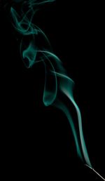 Close-up of object over black background