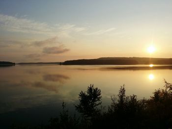 Scenic view of sunset over river