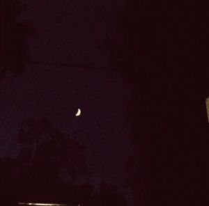 Low angle view of moon at night