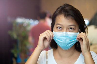 Close-up of woman wearing mask