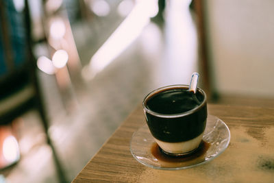 Close-up of coffee cup on table