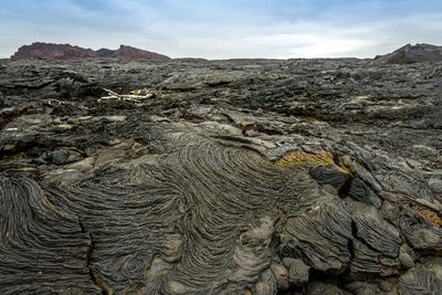 Scenic view of volcanic landscape against sky