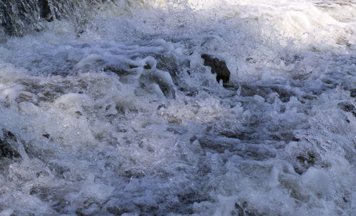 Full frame shot of water flowing in sea