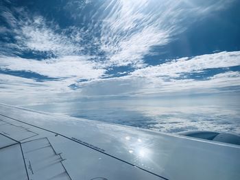 Low angle view of airplane flying in sky