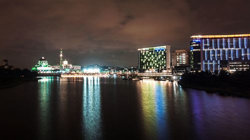 Illuminated buildings at waterfront