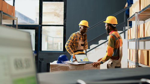 Side view of man working in office