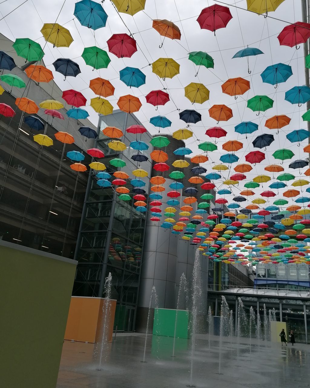 LOW ANGLE VIEW OF LANTERNS HANGING ON WALL