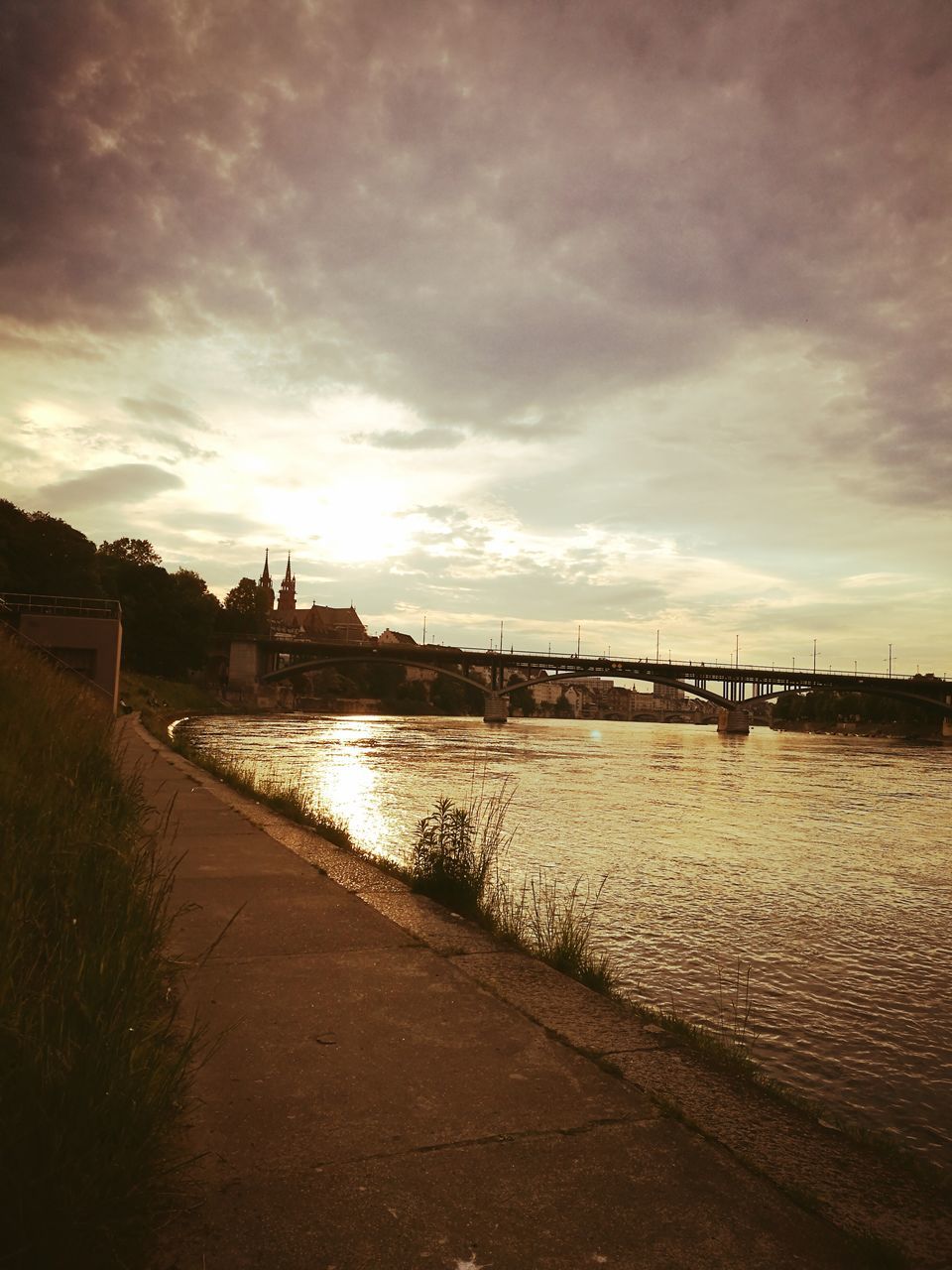 water, cloud - sky, sky, architecture, built structure, sunset, river, building exterior, no people, outdoors, tranquil scene, nature, the way forward, city, scenics, riverbank, beauty in nature, day