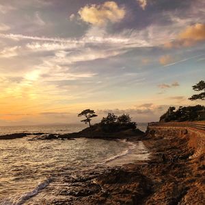 Scenic view of sea against sky during sunset