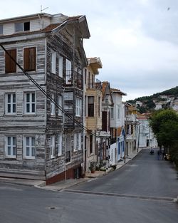 View of old town against cloudy sky