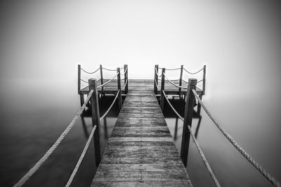 View of suspension bridge in foggy weather