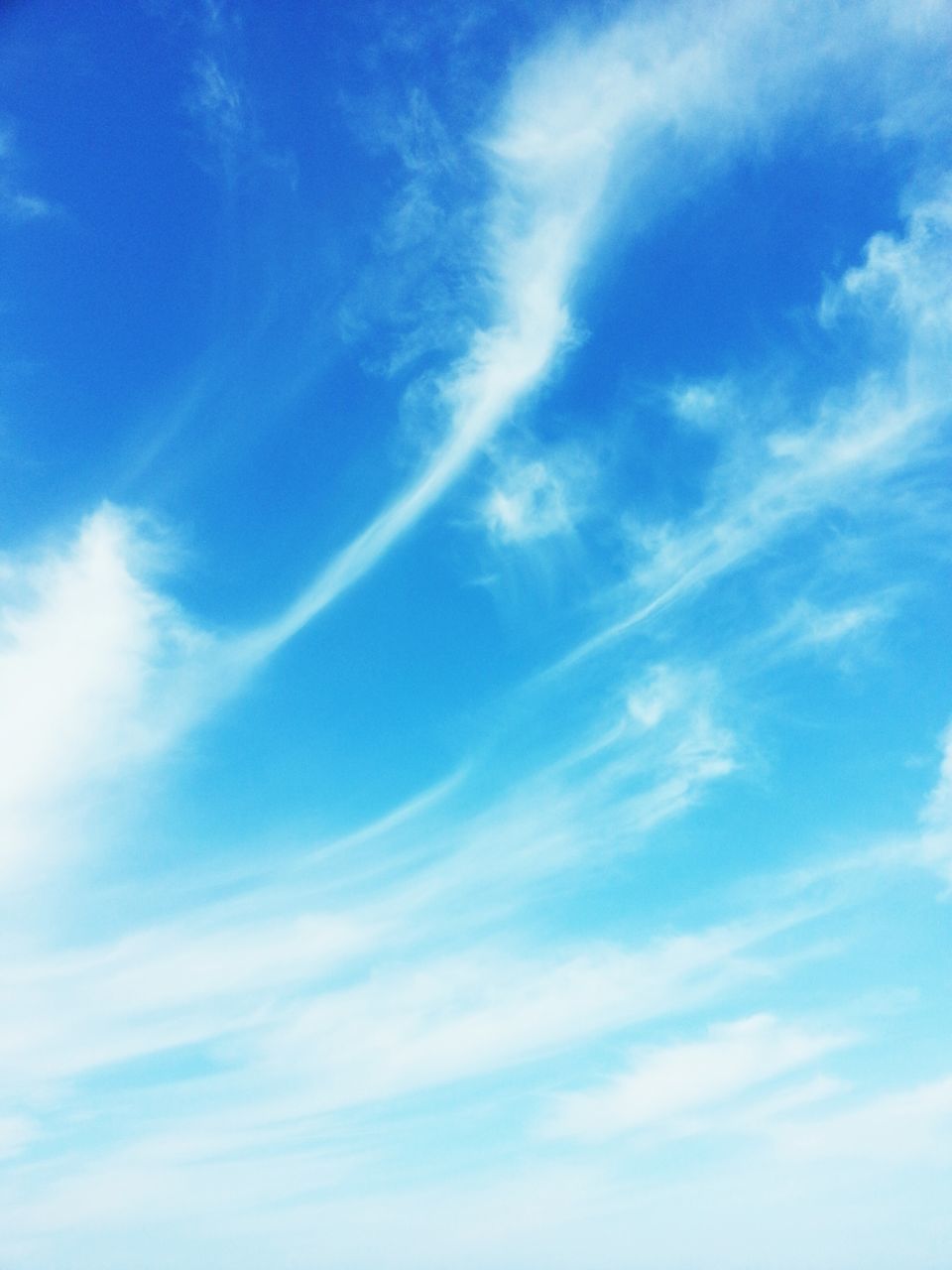 blue, low angle view, sky, cloud - sky, beauty in nature, tranquility, scenics, sky only, nature, tranquil scene, cloud, backgrounds, day, idyllic, outdoors, cloudy, no people, cloudscape, white color, full frame