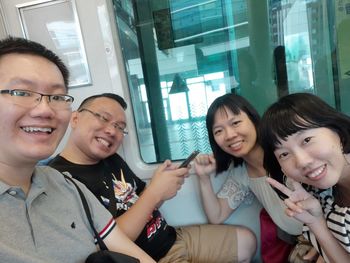 Portrait of happy friends smiling