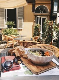 Potted plants on table against window