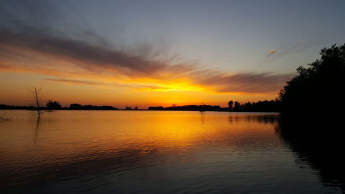 Scenic view of sunset over sea