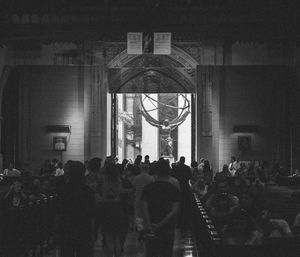 Crowd in front of window