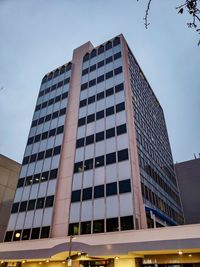 Low angle view of modern building against clear sky