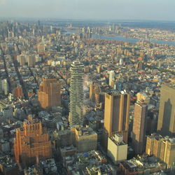 High angle view of modern buildings in city against sky