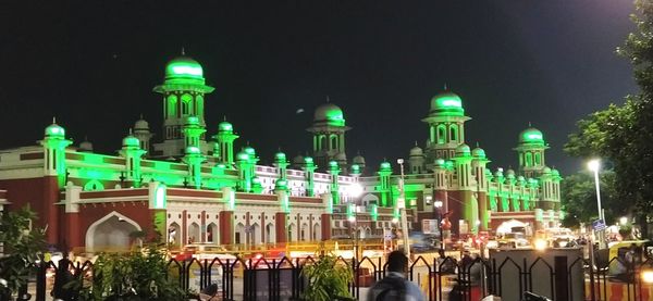 Illuminated buildings in city at night