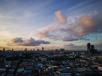 High angle view of buildings against sky during sunset