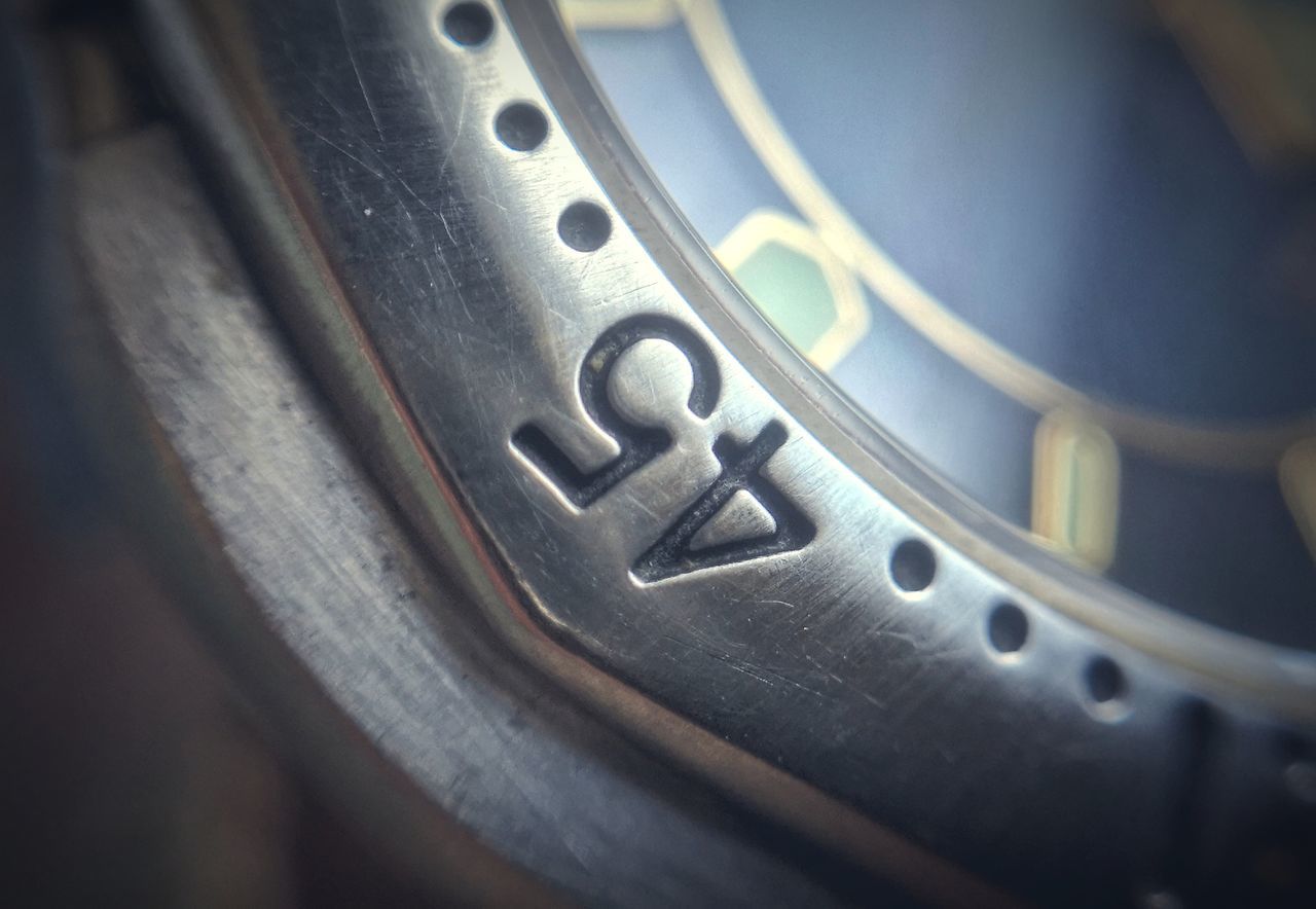 close-up, wheel, tire, watch, technology, no people, indoors, metal, selective focus, time, equipment, automotive tire, macro photography, number