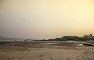 Scenic view of beach against clear sky